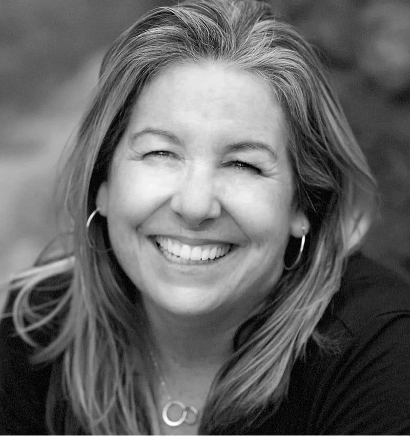 black and white photo of Melanie Perkins McLaughlin